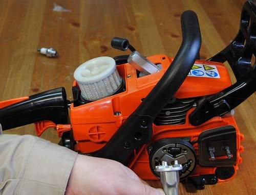 how to assemble a clutch on a chainsaw
