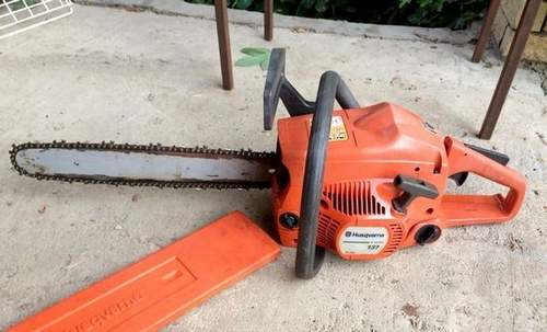 how to disassemble a Husqvarna 137 chainsaw