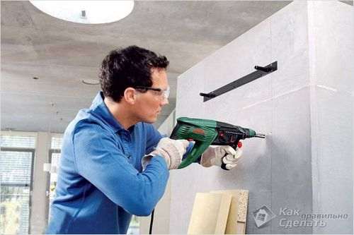 how to properly drill a concrete wall with a hammer drill