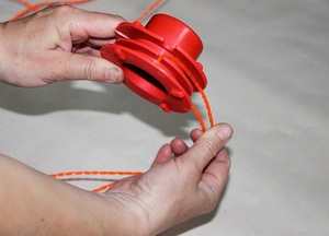 How To Pull The Line Out Of The Trimmer Reel